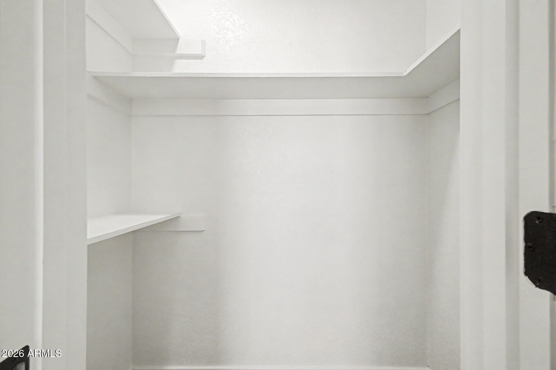 7214 West Flower Street Phoenix, AZ 85033 - Photo 16 of 29 close up of a white marble wall