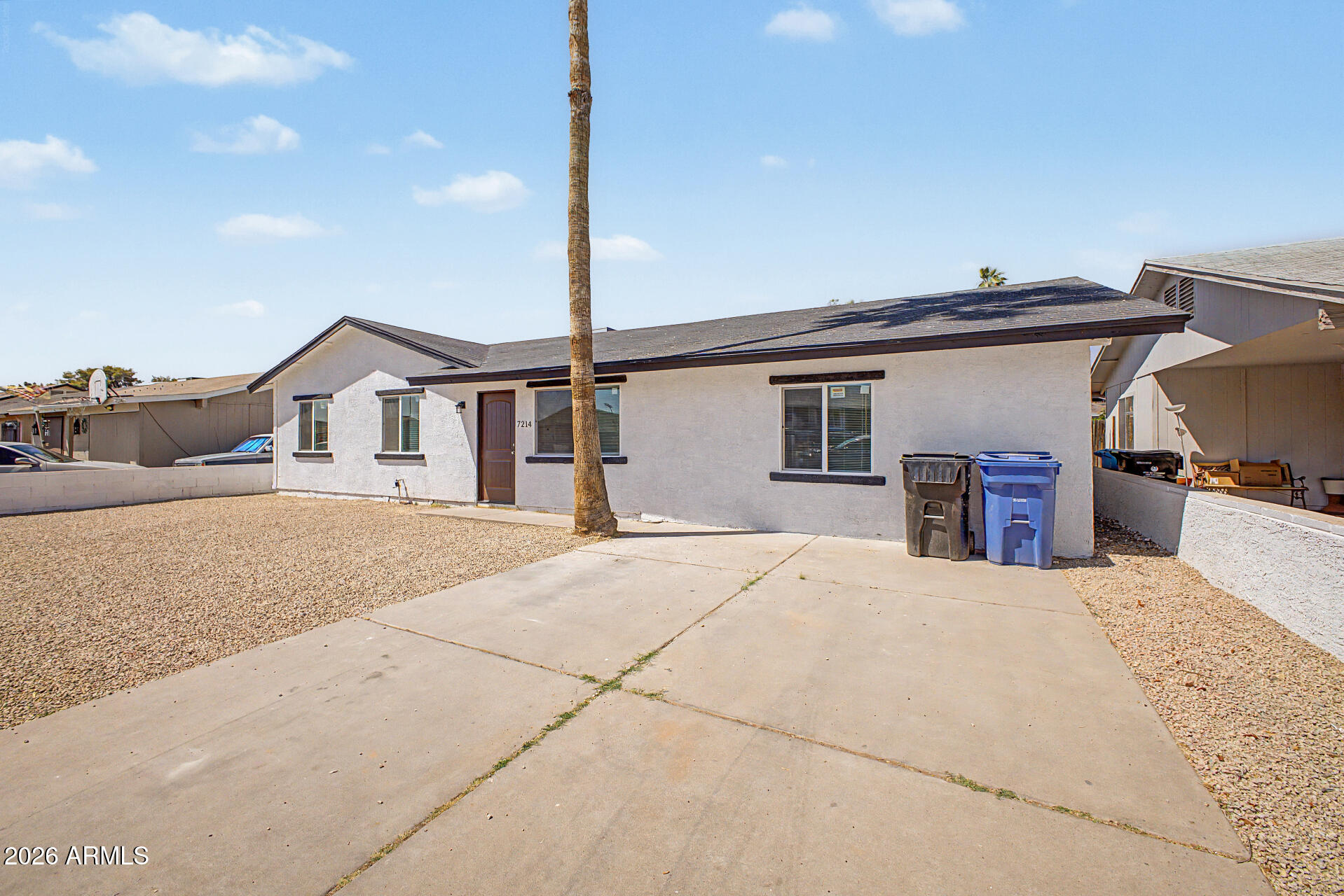7214 West Flower Street Phoenix, AZ 85033 - Photo 2 of 29 a house view with a outdoor space