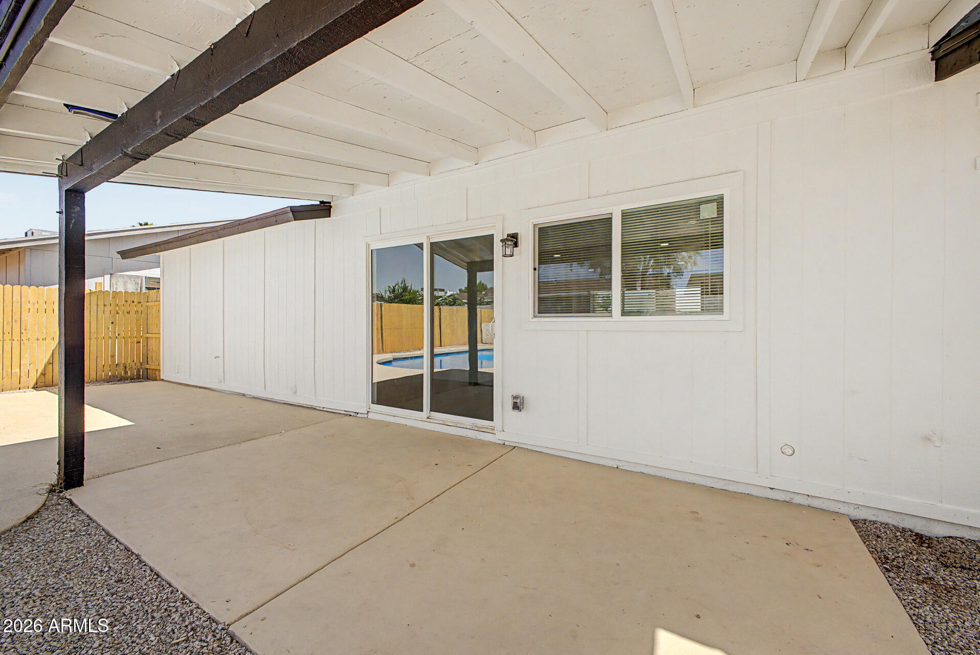 7214 West Flower Street Phoenix, AZ 85033 - Photo 29 of 29 a view of an empty room with a window