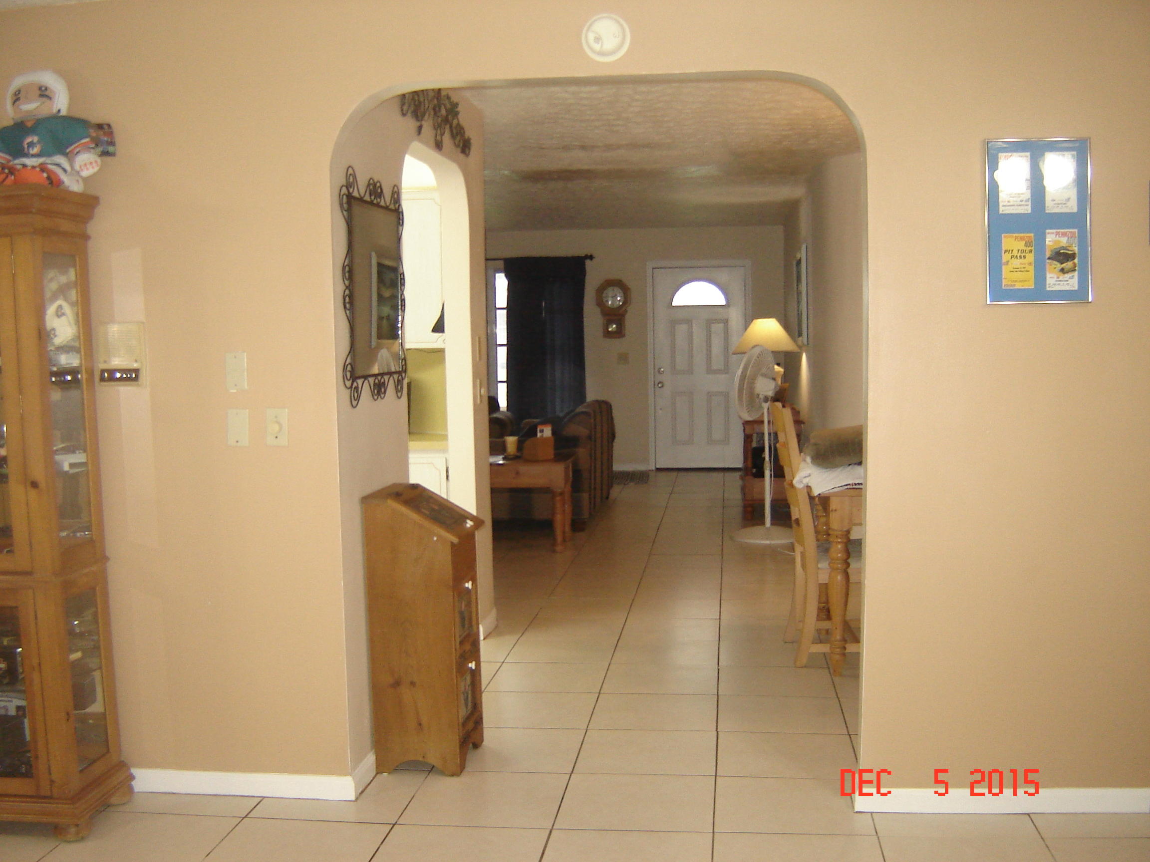 4397 Foss Road Lake Worth, FL 33461 - Photo 2 of 31 From family room to front entry