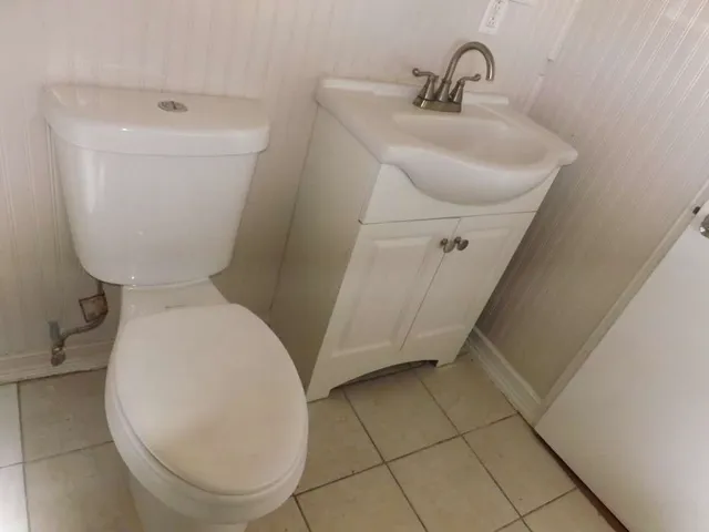 a bathroom with a sink and a toilet