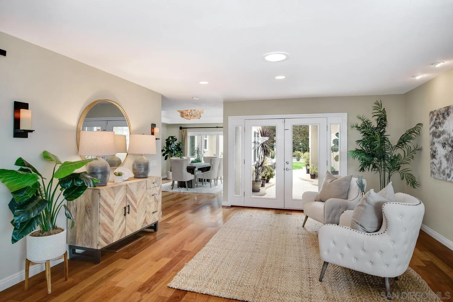 5459 Moonlight Lane La Jolla, CA 92037 - Photo 12 of 42 a living room with furniture and a large window