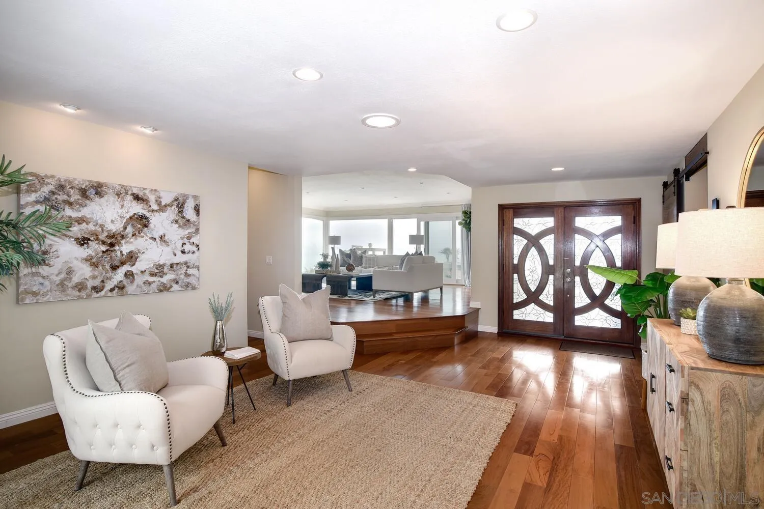 5459 Moonlight Lane La Jolla, CA 92037 - Photo 13 of 42 a living room with furniture and a large window