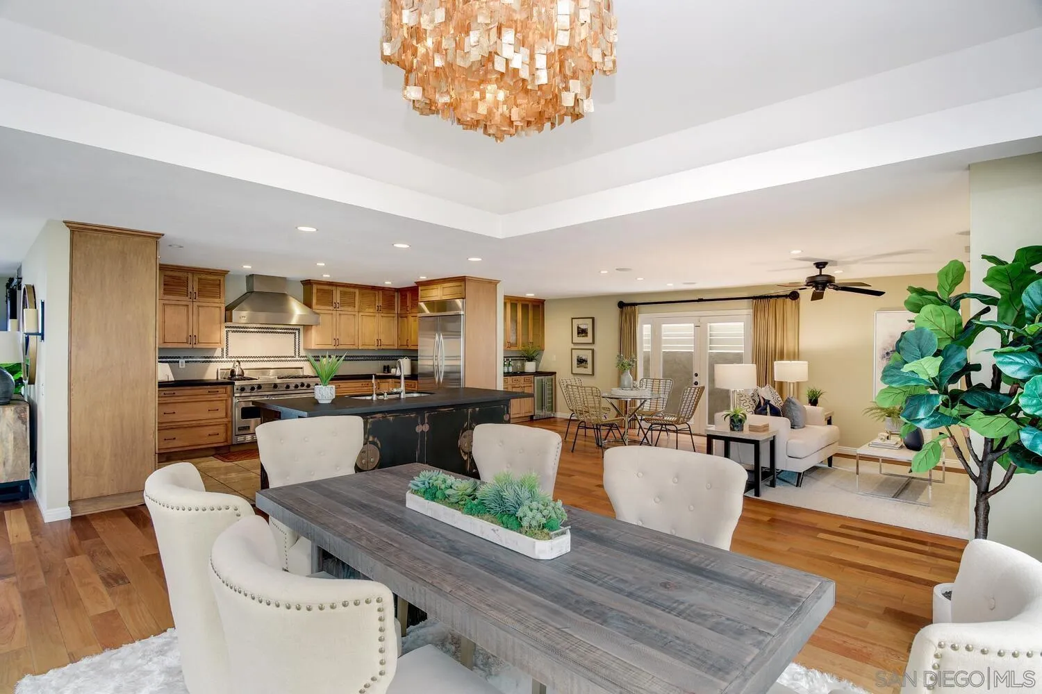 5459 Moonlight Lane La Jolla, CA 92037 - Photo 15 of 42 a living room with furniture kitchen view and a large window