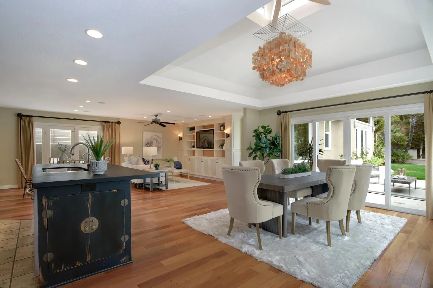 5459 Moonlight Lane La Jolla, CA 92037 - Photo 17 of 42 a view of a dining room with furniture window and wooden floor