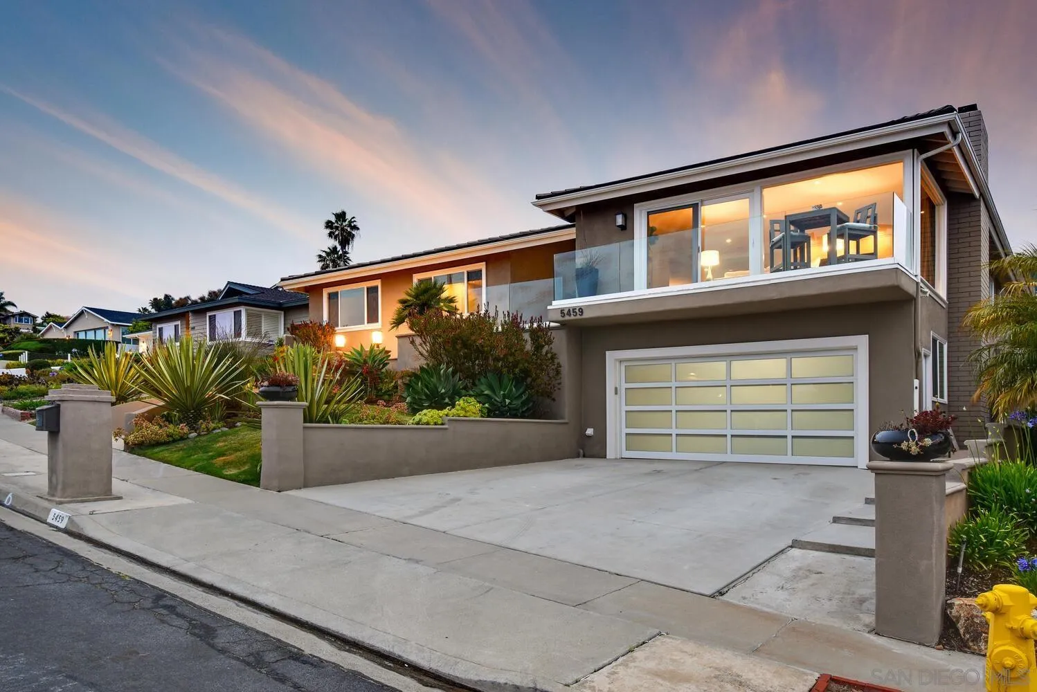 5459 Moonlight Lane La Jolla, CA 92037 - Photo 2 of 42 front view of a house with a street