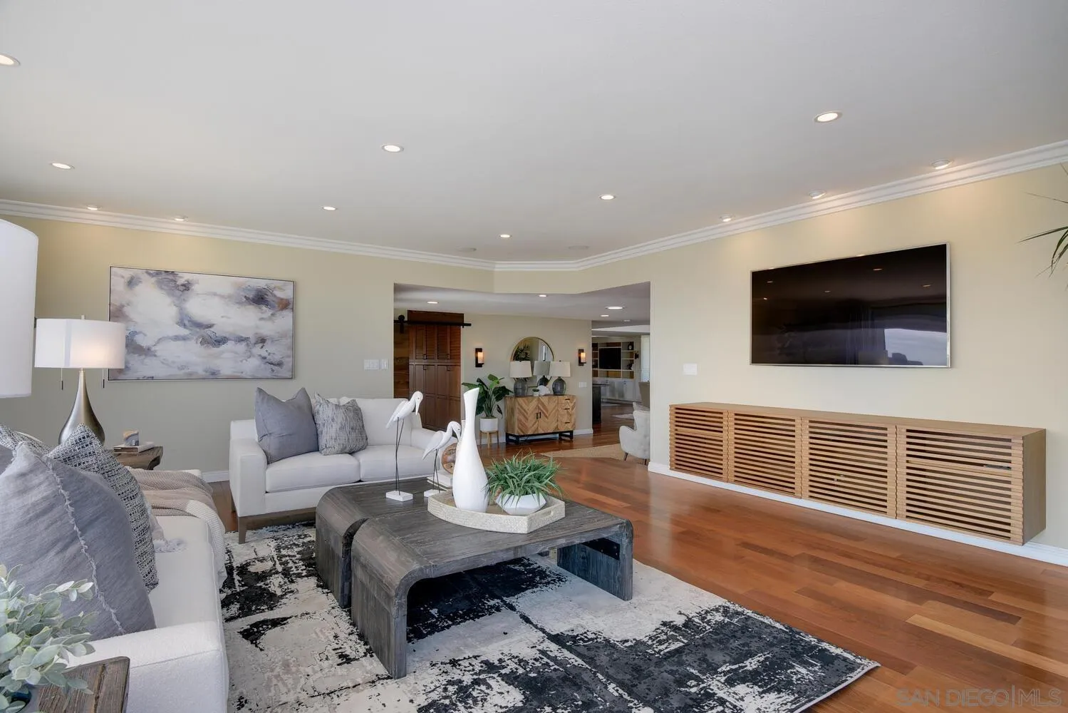 5459 Moonlight Lane La Jolla, CA 92037 - Photo 22 of 42 a living room with furniture and a flat screen tv