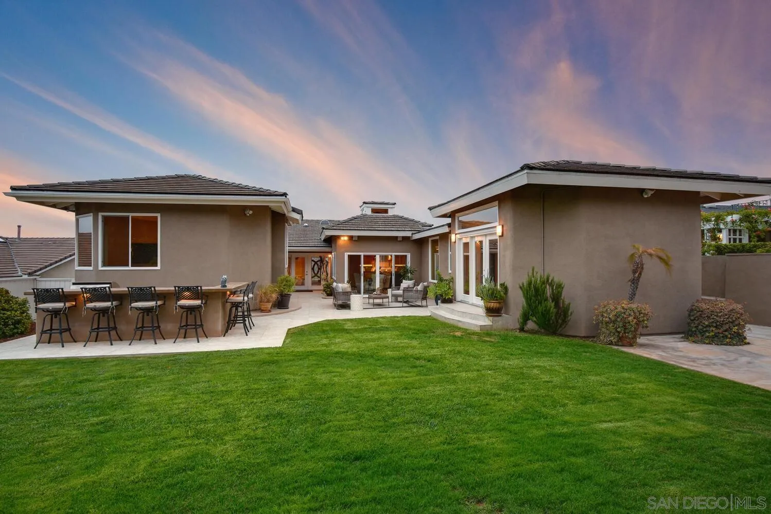 5459 Moonlight Lane La Jolla, CA 92037 - Photo 28 of 42 a front view of house with yard and outdoor seating