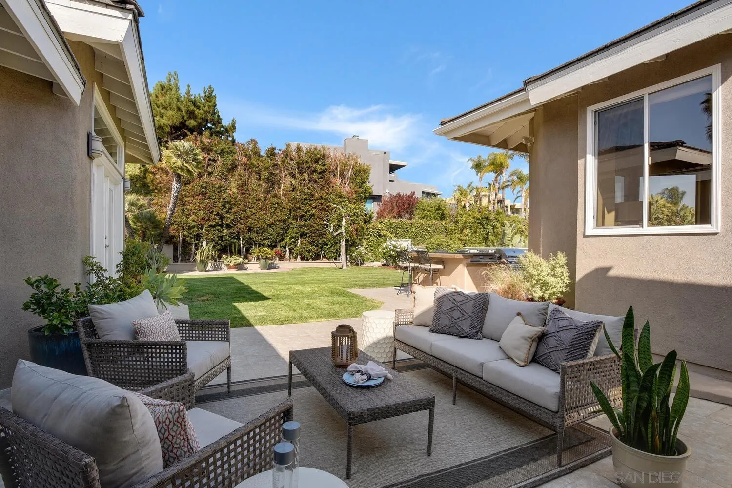 5459 Moonlight Lane La Jolla, CA 92037 - Photo 30 of 42 a view of a patio with couches and potted plants