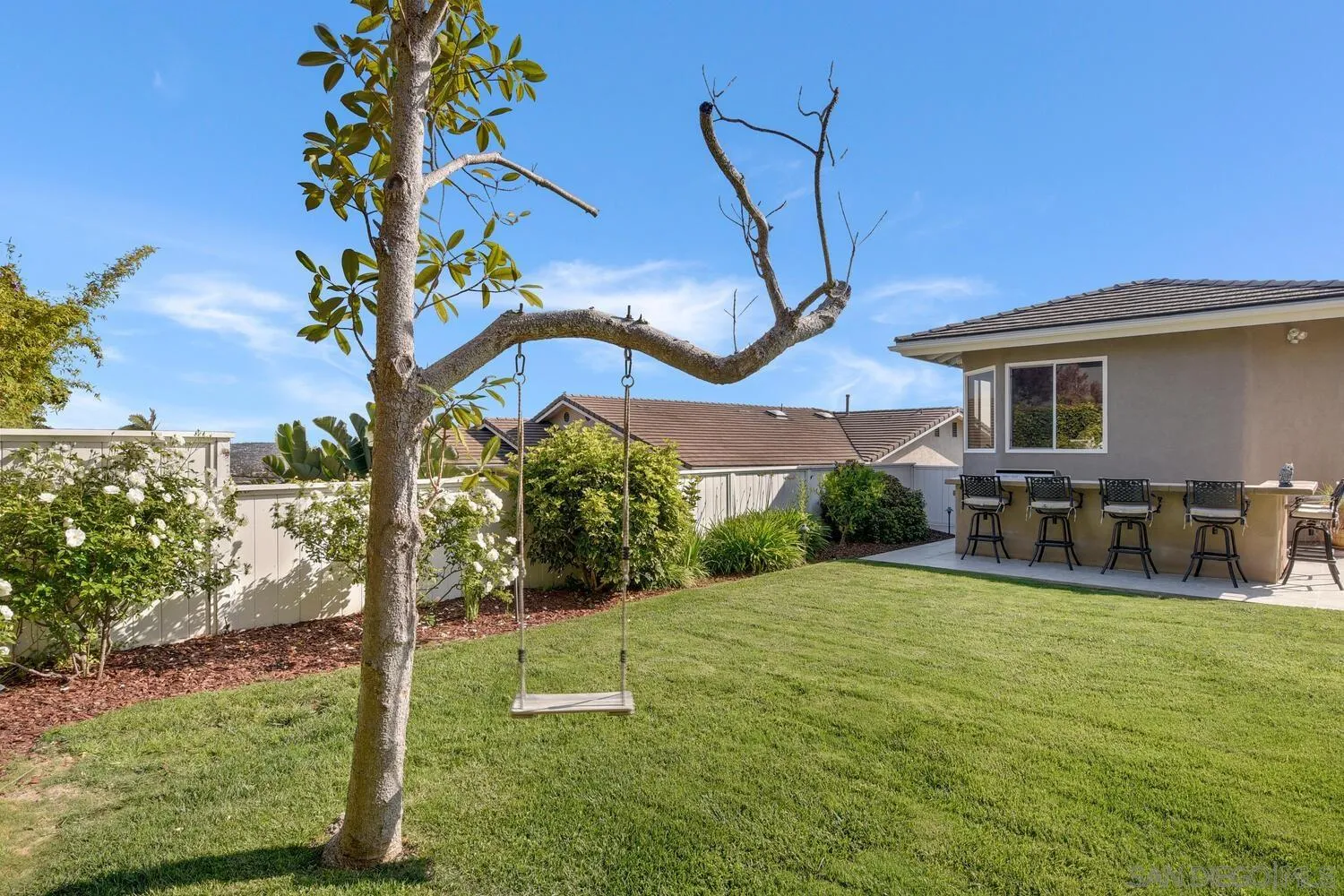 5459 Moonlight Lane La Jolla, CA 92037 - Photo 33 of 42 a view of a house with backyard and sitting area