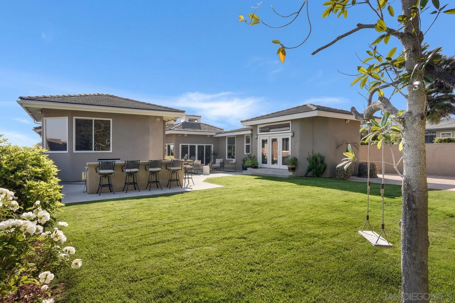 5459 Moonlight Lane La Jolla, CA 92037 - Photo 34 of 42 a view of a house with swimming pool and porch with furniture