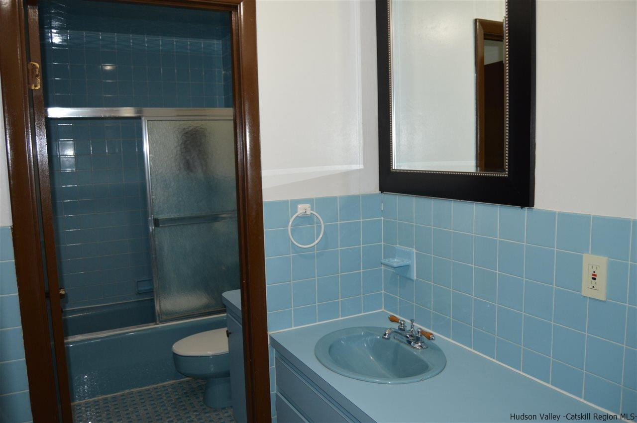8 Skytop Drive Kingston, NY 12401 - Photo 14 of 23 a bathroom with a sink a toilet and shower
