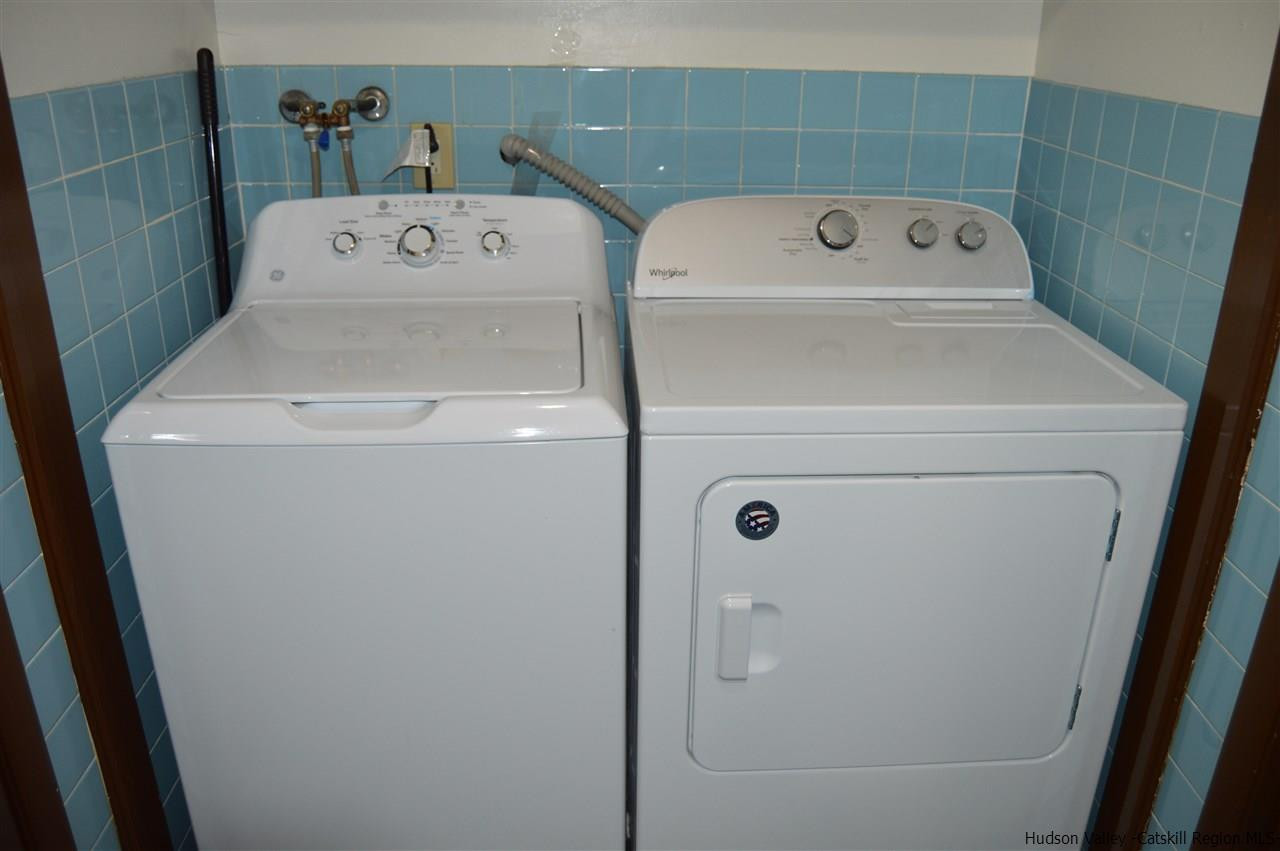 8 Skytop Drive Kingston, NY 12401 - Photo 15 of 23 a utility room with dryer and washer