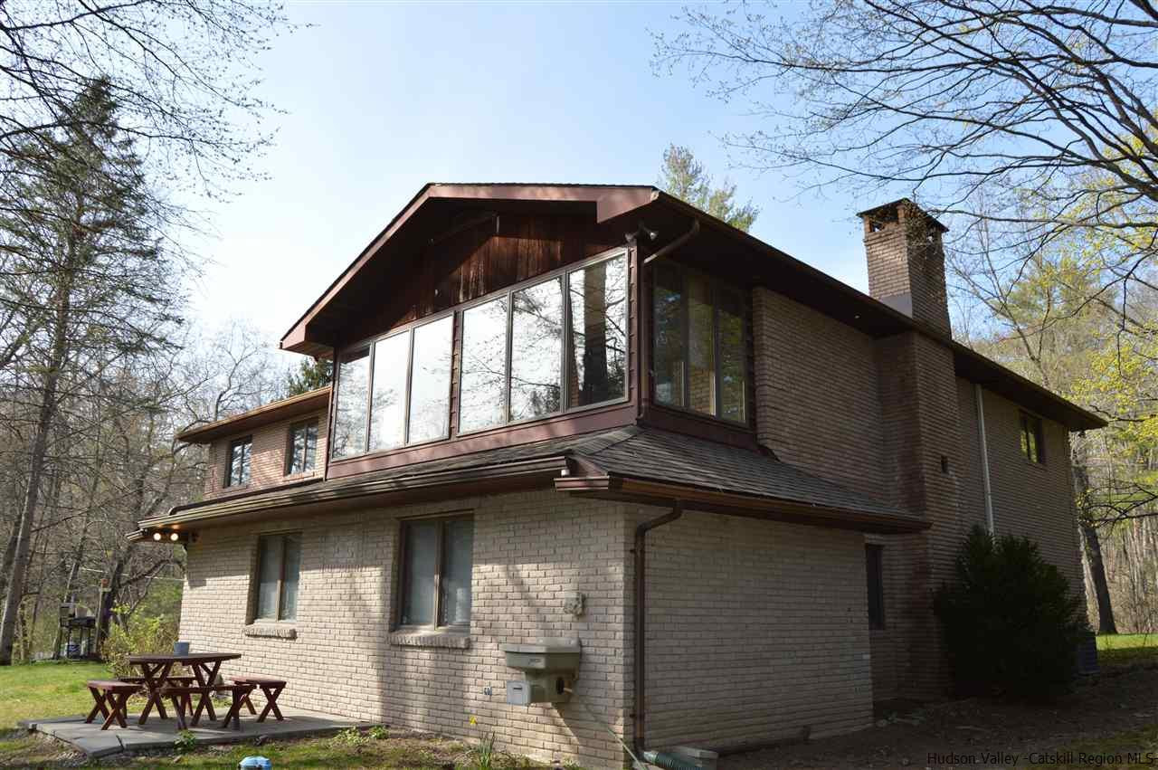 8 Skytop Drive Kingston, NY 12401 - Photo 2 of 23 a view of a house with a iron gate