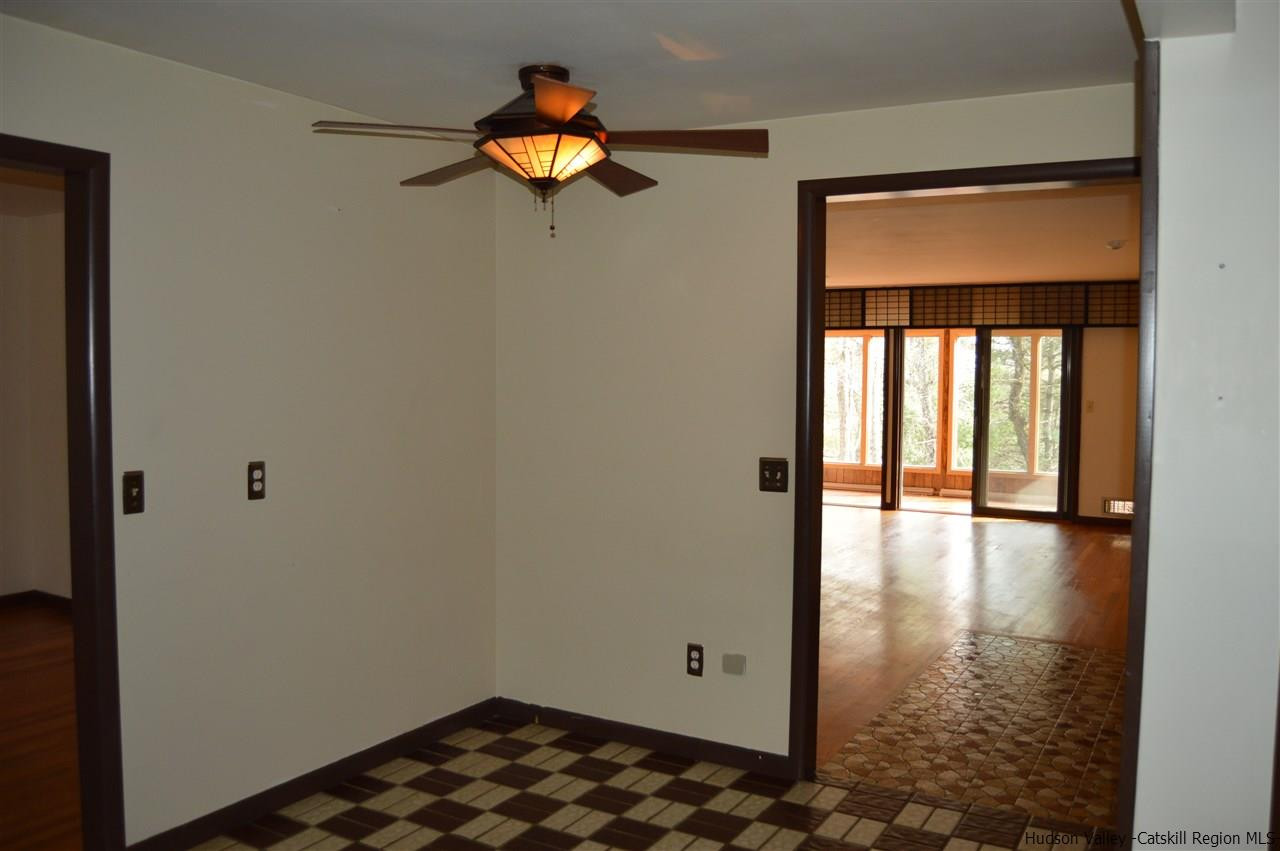 8 Skytop Drive Kingston, NY 12401 - Photo 6 of 23 a view of a room with window and wooden floor