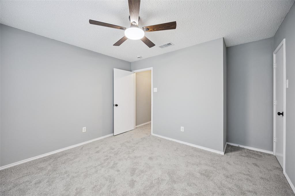621 Renaissance Place Cedar Hill, TX 75104 - Photo 22 of 28 an empty room with ceiling fan