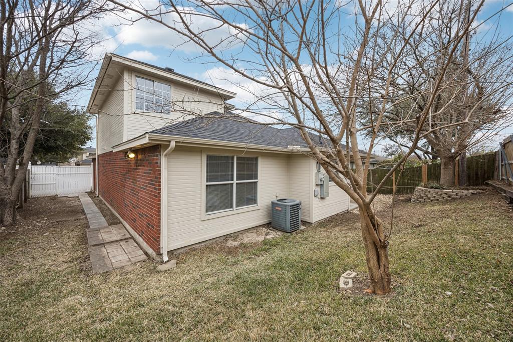 621 Renaissance Place Cedar Hill, TX 75104 - Photo 23 of 28 a view of a house with a yard