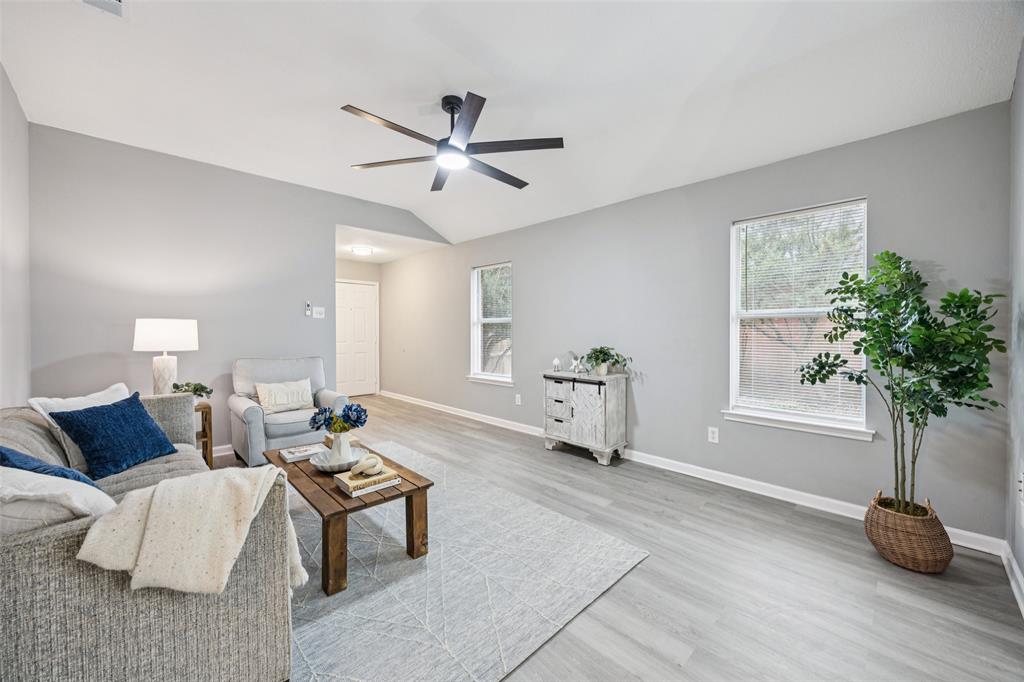 621 Renaissance Place Cedar Hill, TX 75104 - Photo 5 of 28 a living room with furniture and a potted plant