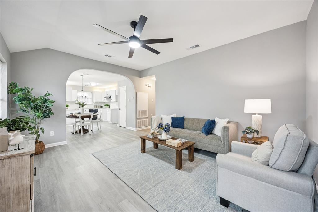 621 Renaissance Place Cedar Hill, TX 75104 - Photo 6 of 28 a living room with furniture and wooden floor
