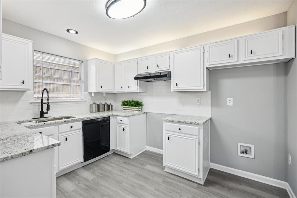 621 Renaissance Place Cedar Hill, TX 75104 - Photo 8 of 28 a kitchen with granite countertop white cabinets white appliances and sink