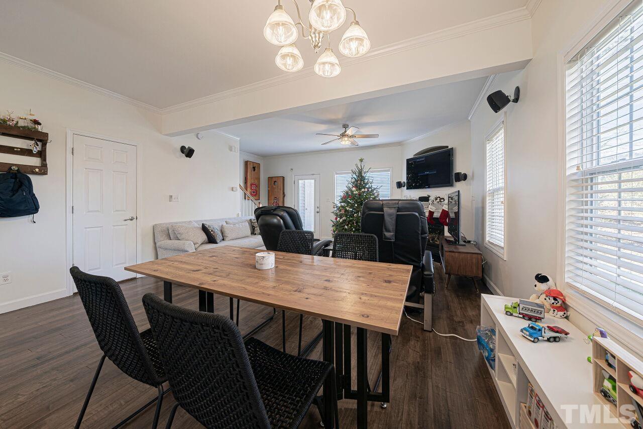 4500 Centrebrook Circle Raleigh, NC 27616 - Photo 12 of 39 a view of a dining room with furniture and wooden floor