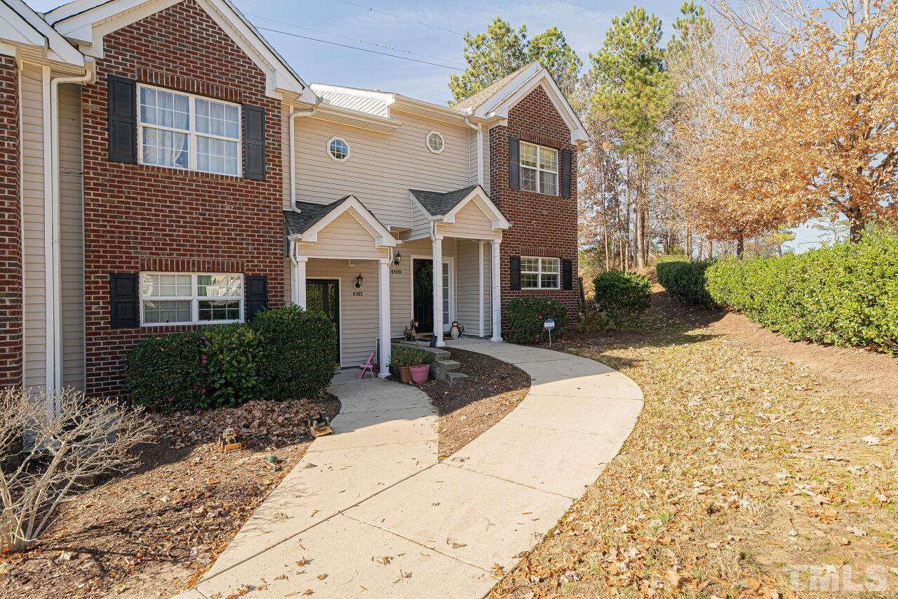 4500 Centrebrook Circle Raleigh, NC 27616 - Photo 3 of 39 a front view of a house with yard and tress
