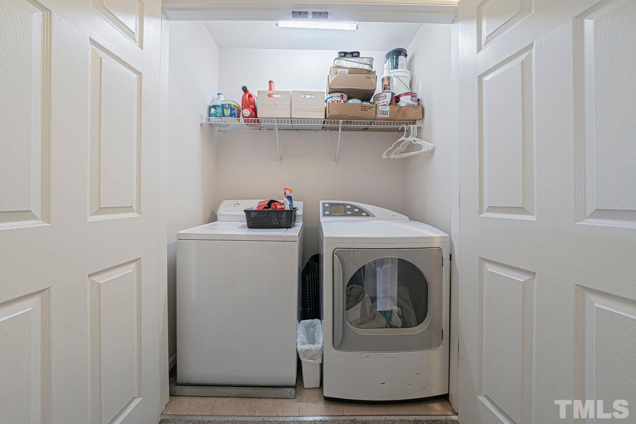 4500 Centrebrook Circle Raleigh, NC 27616 - Photo 23 of 39 a utility room with sink dryer and washer