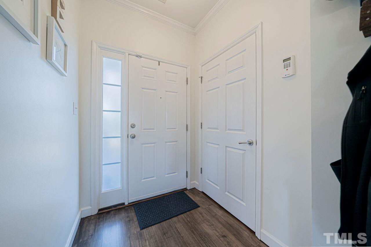 4500 Centrebrook Circle Raleigh, NC 27616 - Photo 4 of 39 a view of an empty room with wooden floor