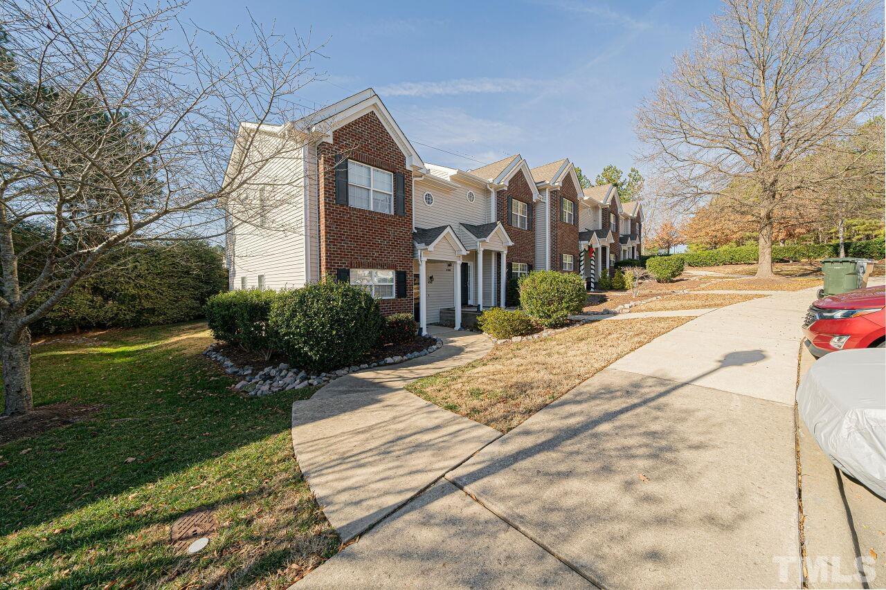 4500 Centrebrook Circle Raleigh, NC 27616 - Photo 38 of 39 a view of a building with a yard