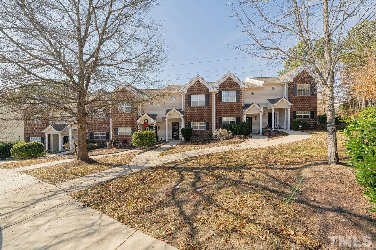 4500 Centrebrook Circle Raleigh, NC 27616 - Photo 39 of 39 a view of a white house with a yard covered in snow