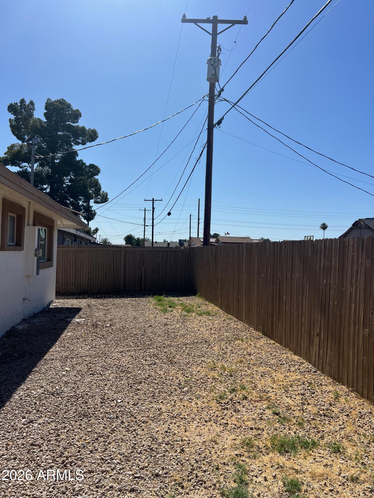 3818 West Ruth Avenue Phoenix, AZ 85051 - Photo 19 of 20 a view of a backyard of the house