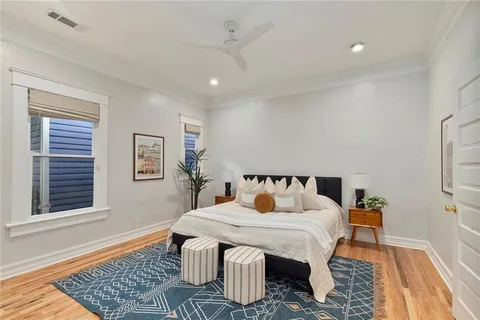 a bed room with a bed and a window