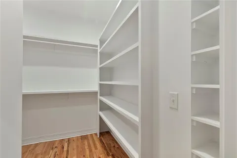 a view of an empty walk in closet