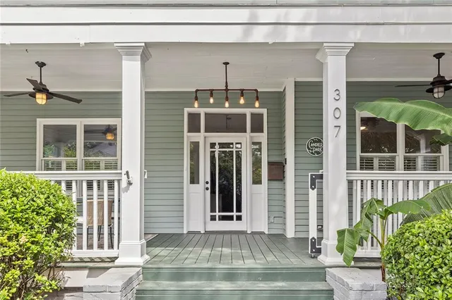 a front view of a house with a porch
