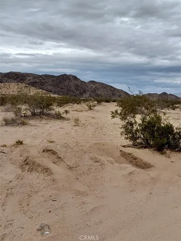 a view of lake with mountain