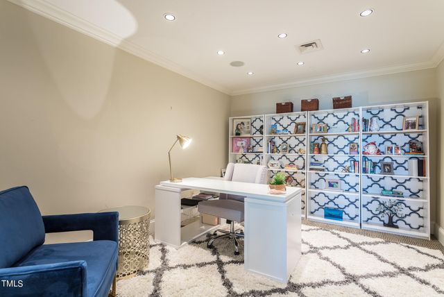 a workspace with furniture and lamp