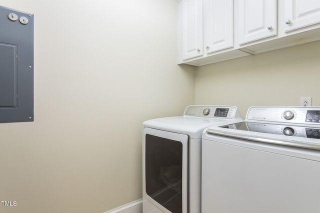 a view of a hallway with a livingroom