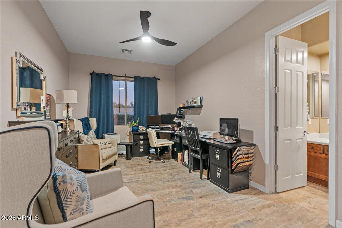 6427 South Magic Court Gilbert, AZ 85298 - Photo 14 of 71 a living room with furniture and a window