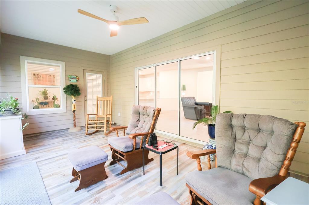 19511 Southwest 77th Loop Dunnellon, FL 34432 - Photo 20 of 27 a living room with furniture and a large window