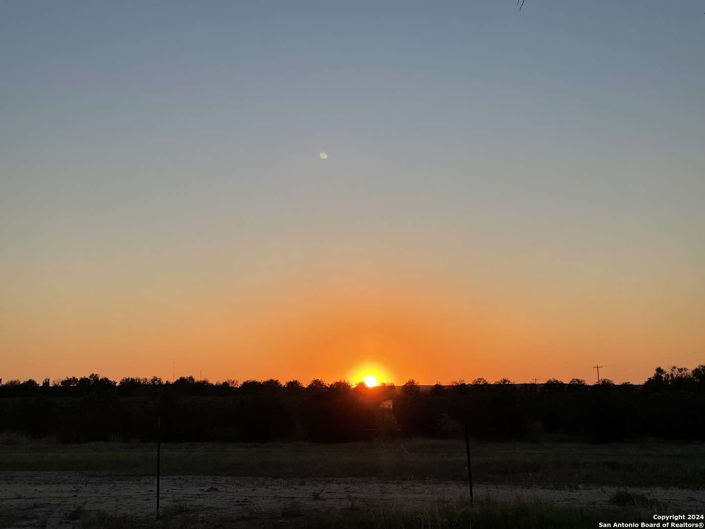 210 County Road 4643 Hondo, TX 78861 - Photo 12 of 12 a view of sunset