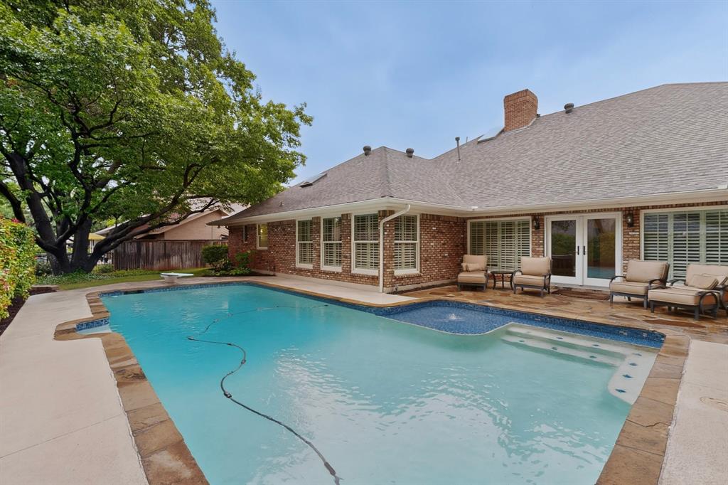 2405 Wing Point Lane Plano, TX 75093 - Photo 34 of 39 a view of a house with swimming pool and sitting area