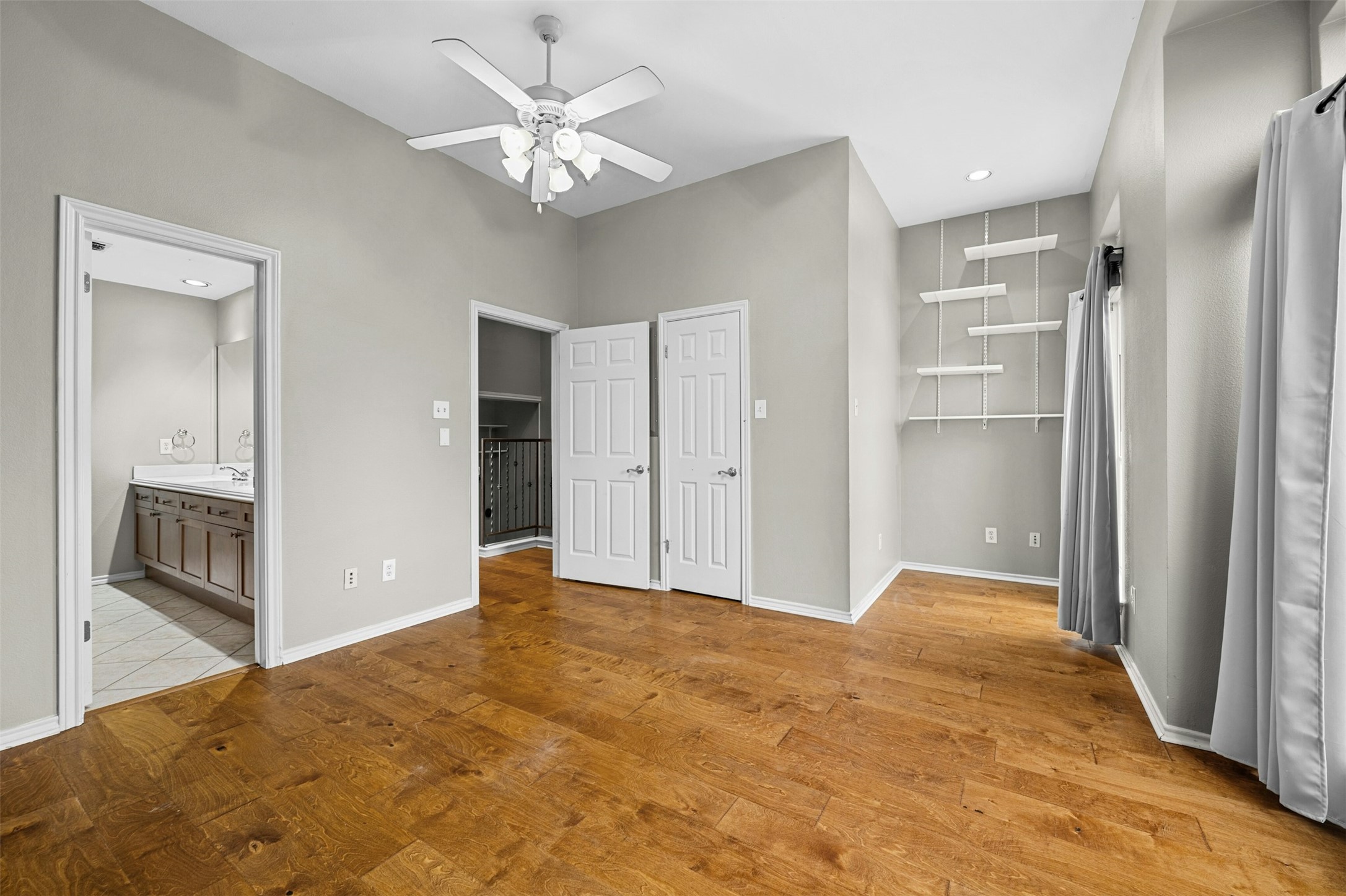 2918 Ranch To Market Road 620, Unit W219 Austin, TX 78734 - Photo 27 of 35 The second bedroom features its own ensuite with dual vanity and full tub/shower - ideal for guests or roommates.