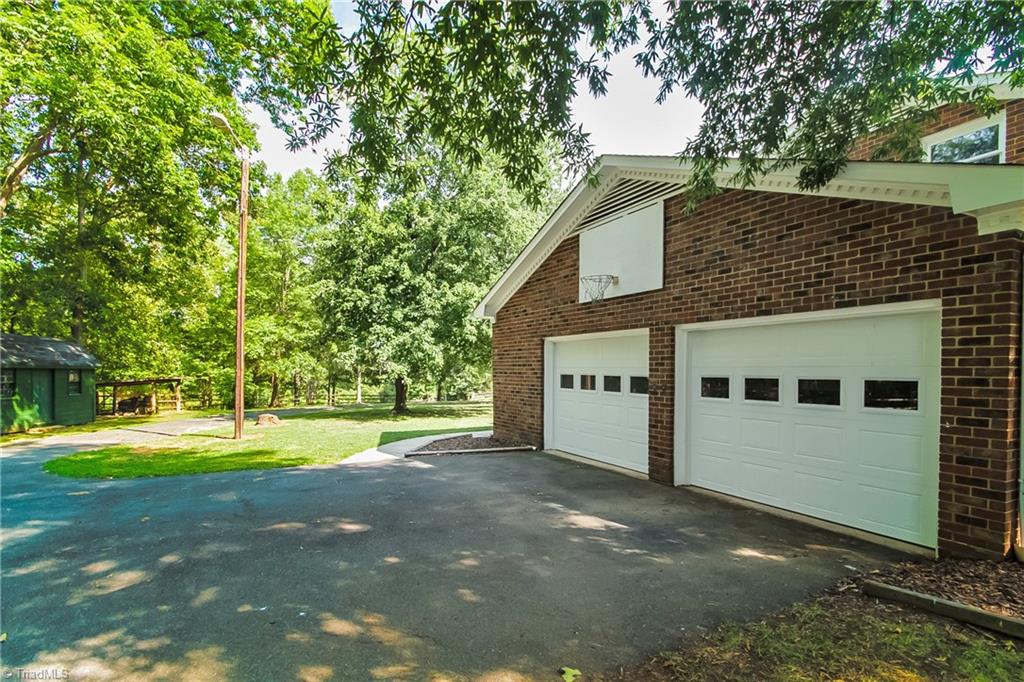 2278 Huffman Mill Road Burlington, NC 27215 - Photo 23 of 24 Attached two-car garage.