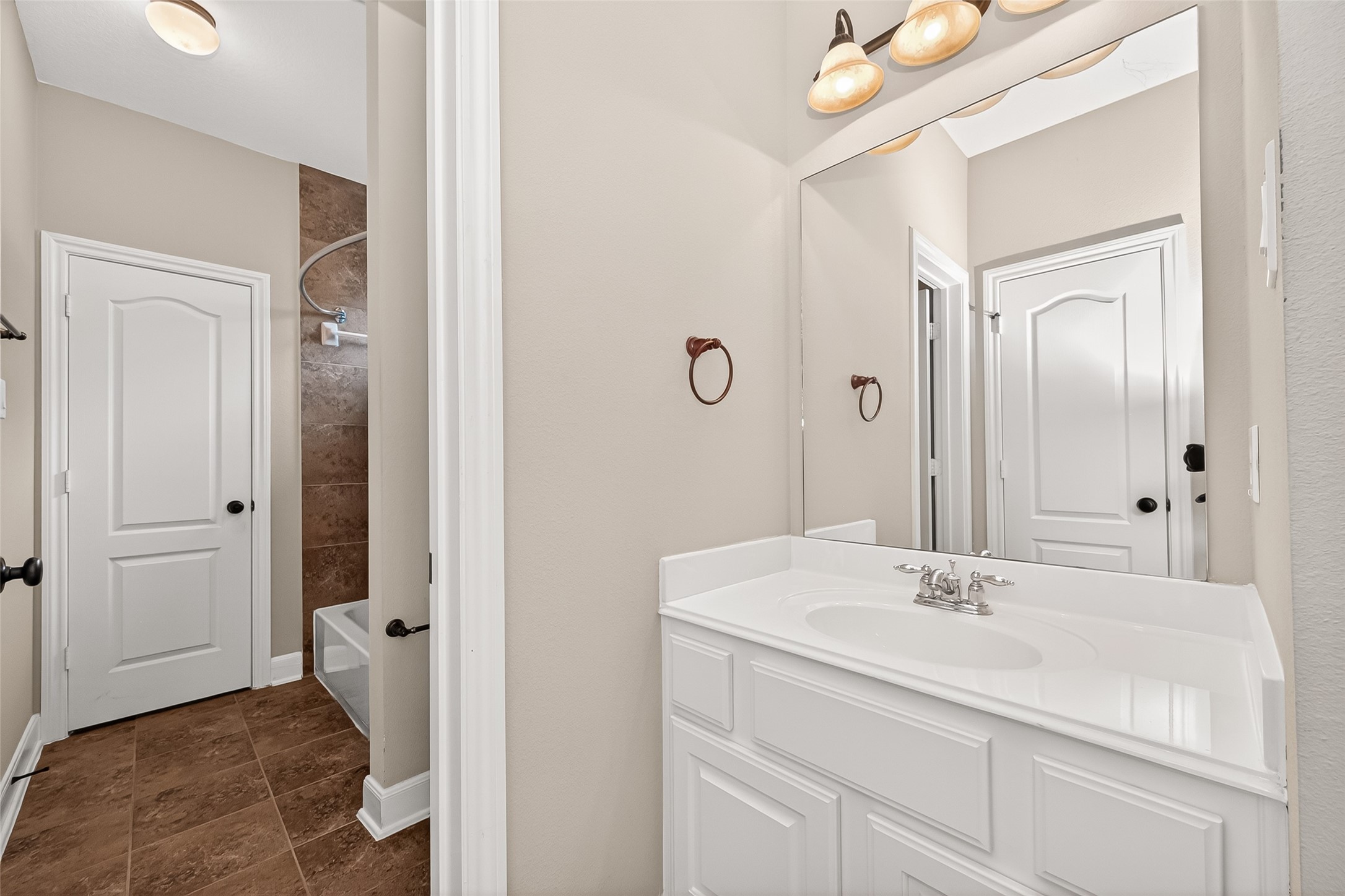 2310 Spring Lake Park Lane Spring, TX 77386 - Photo 29 of 47 a bathroom with a sink and a mirror