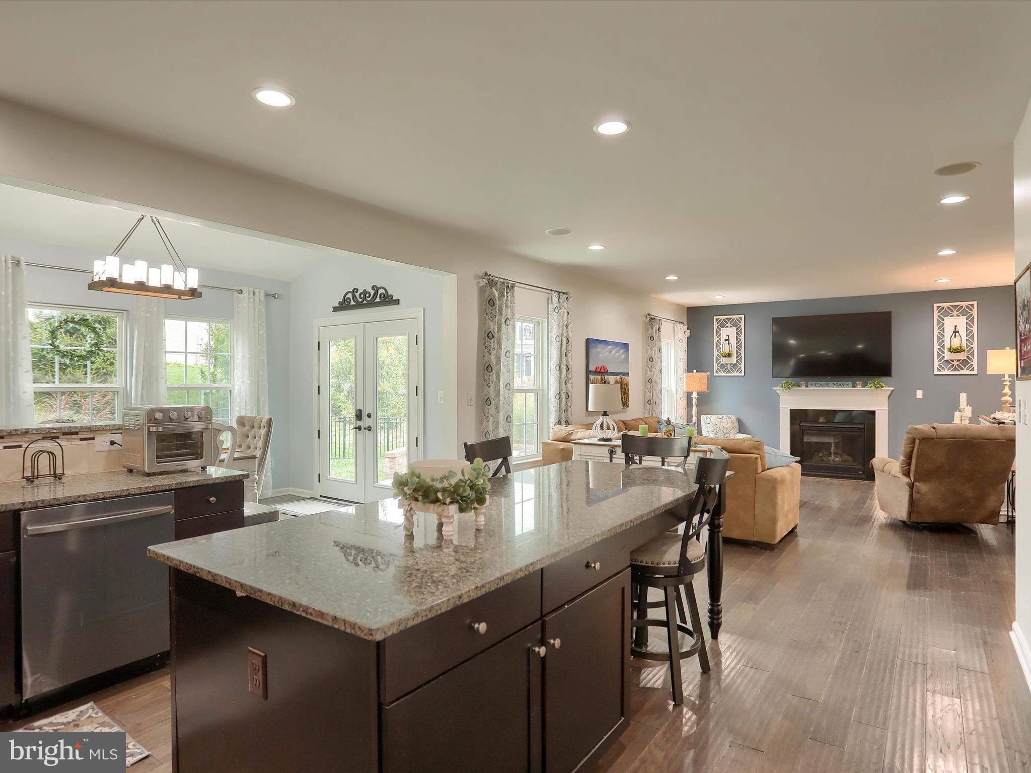 3930 Seattle Slew Drive Harrisburg, PA 17112 - Photo 11 of 48 a kitchen with sink refrigerator and couches