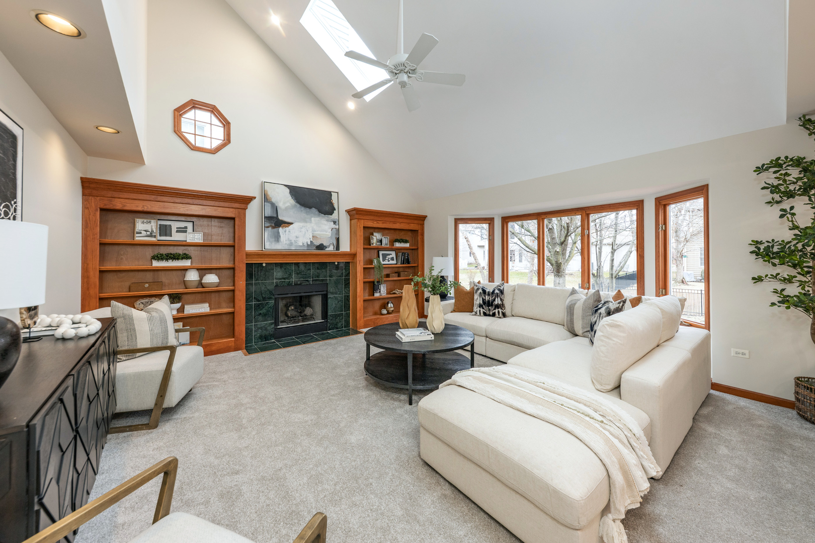 2703 Wait Road Naperville, IL 60564 - Photo 14 of 35 a living room with furniture a fireplace and a flat screen tv