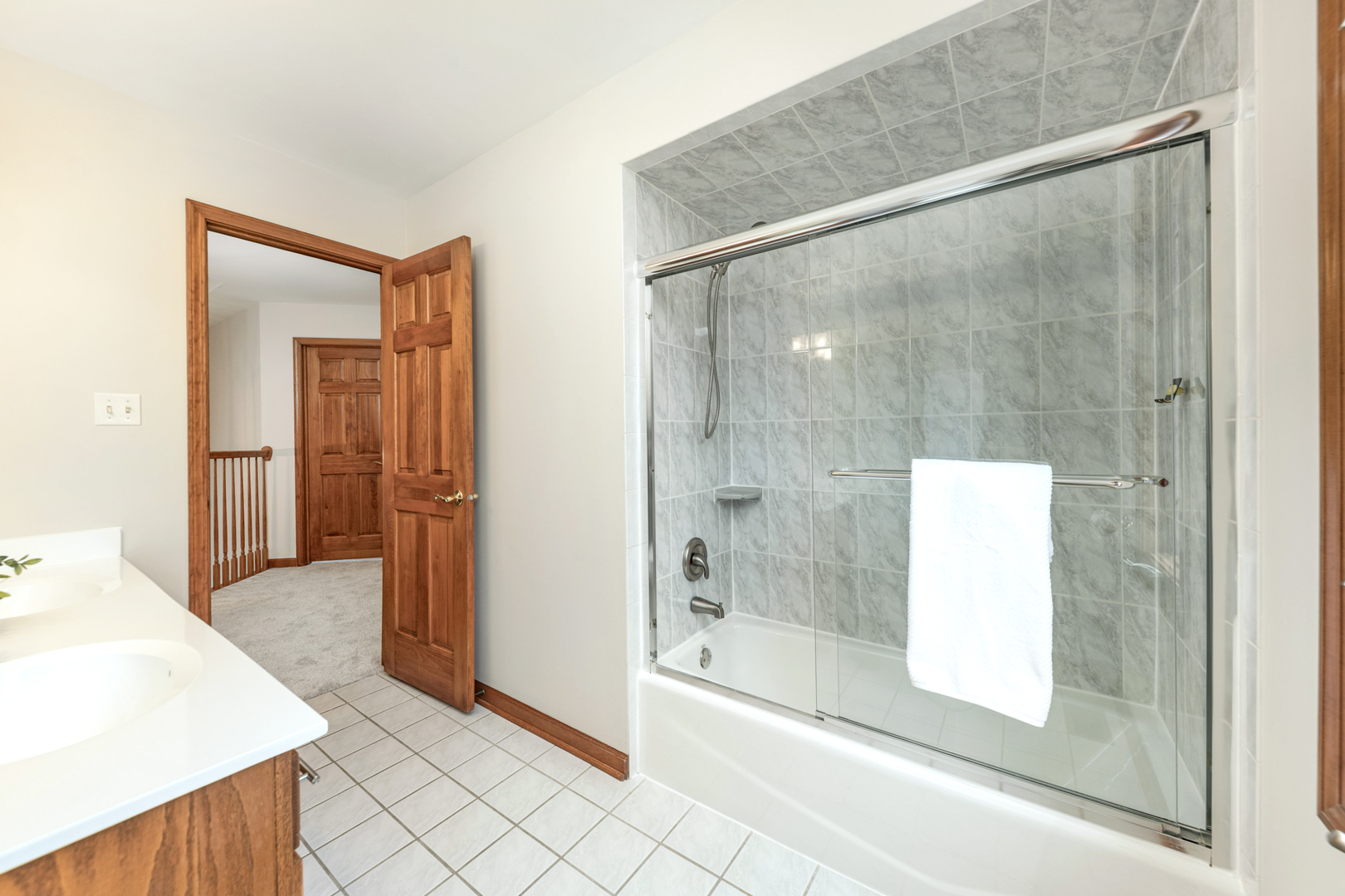 2703 Wait Road Naperville, IL 60564 - Photo 22 of 35 a bathroom with a glass shower door