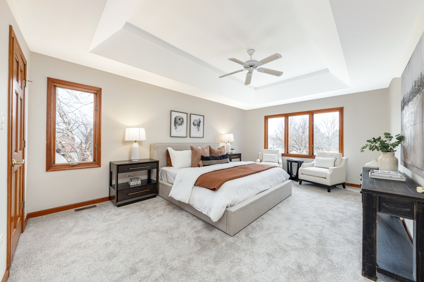 2703 Wait Road Naperville, IL 60564 - Photo 23 of 35 a spacious bedroom with a bed a couch and a window