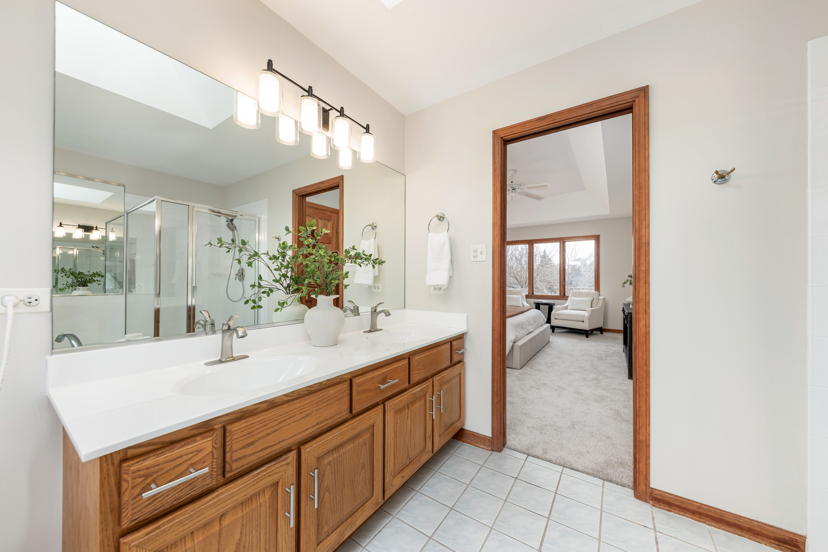 2703 Wait Road Naperville, IL 60564 - Photo 25 of 35 a bathroom with a sink and a mirror