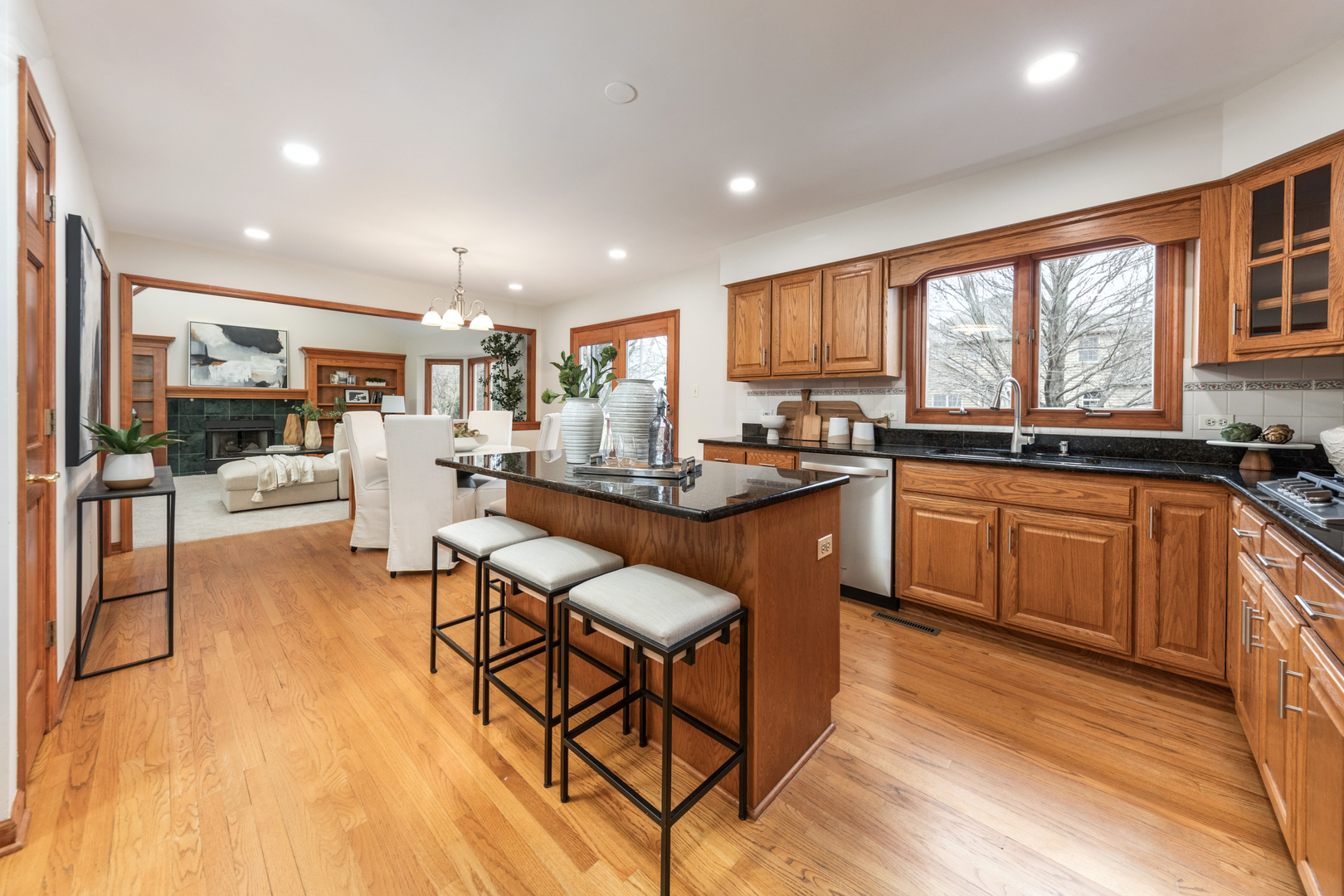 2703 Wait Road Naperville, IL 60564 - Photo 8 of 35 a kitchen with stainless steel appliances granite countertop sink stove top oven and cabinets